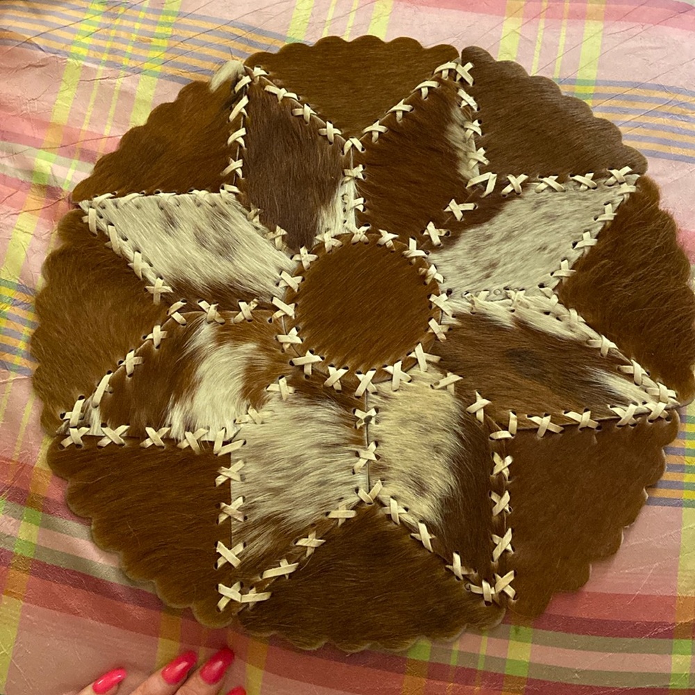 Vintage cowhide handlaced round place mat